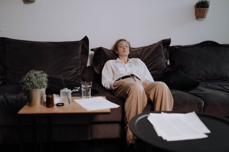 a woman sitting on the couch